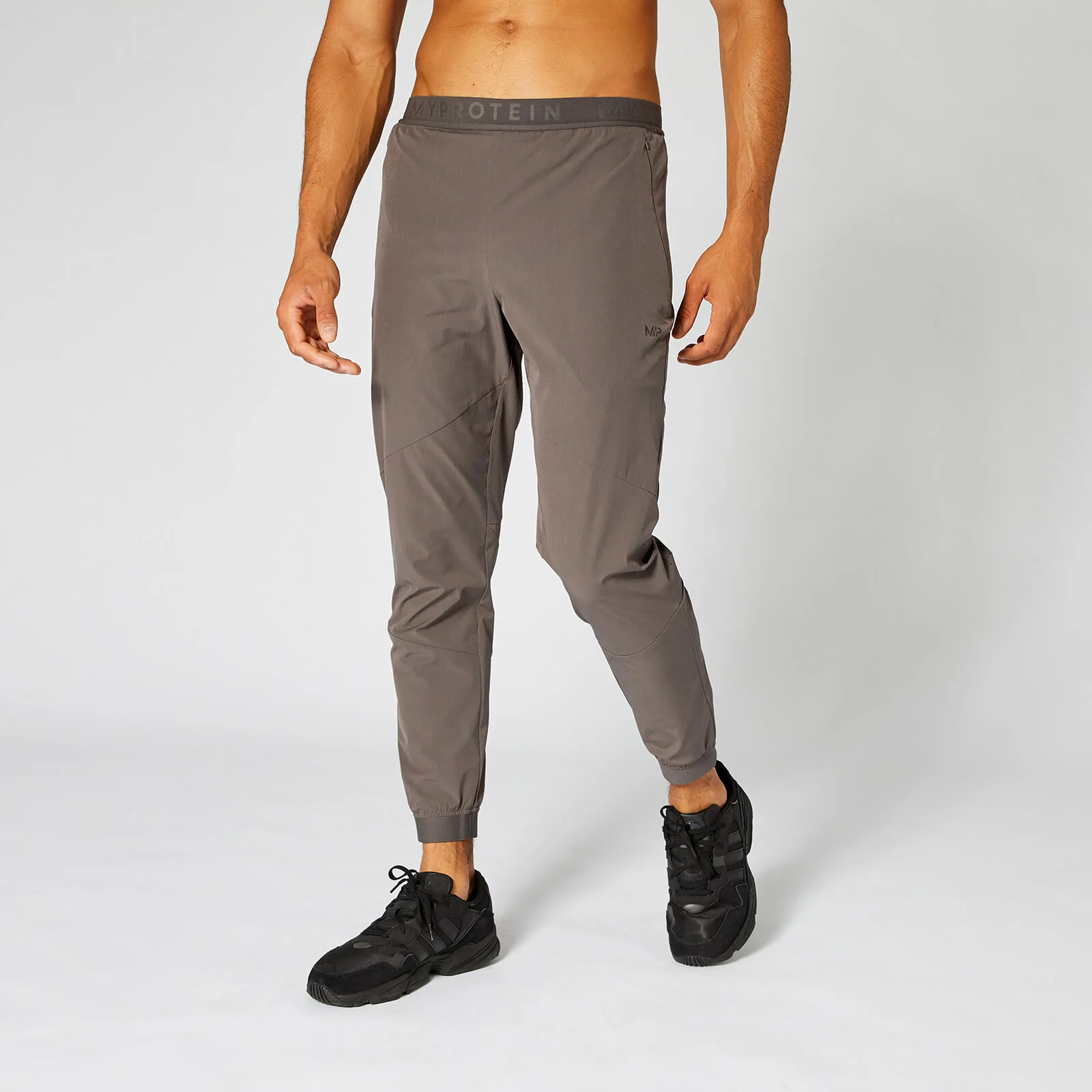 Joggers Training Pace Woven - Marrón - XS Imagen 1