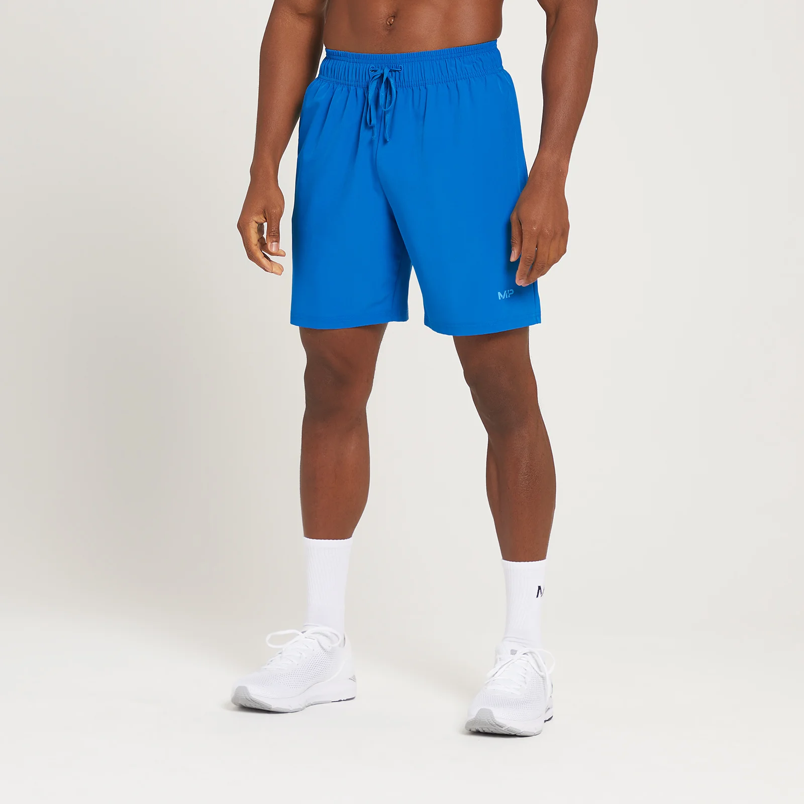 Pantalón corto de entrenamiento con detalle gráfico Linear Mark para hombre de MP - Azul medio - XXS Imagen 1