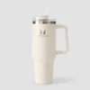 Botella de acero con asa lateral y pajita de Myprotein 1200 ml - Crema natural