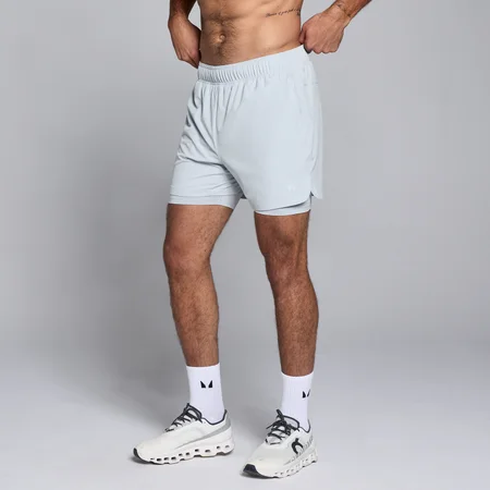 Pantalones cortos de entrenamiento 2 en 1 de largo de entrepierna de 13 cm para hombre de MP - Azul pálido