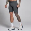 Mallas de media longitud Hybrid Pocket para hombre de MP - Gris oscuro/Verde